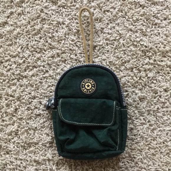 Kipling Handbags - NWOT-Kipling mini backpack